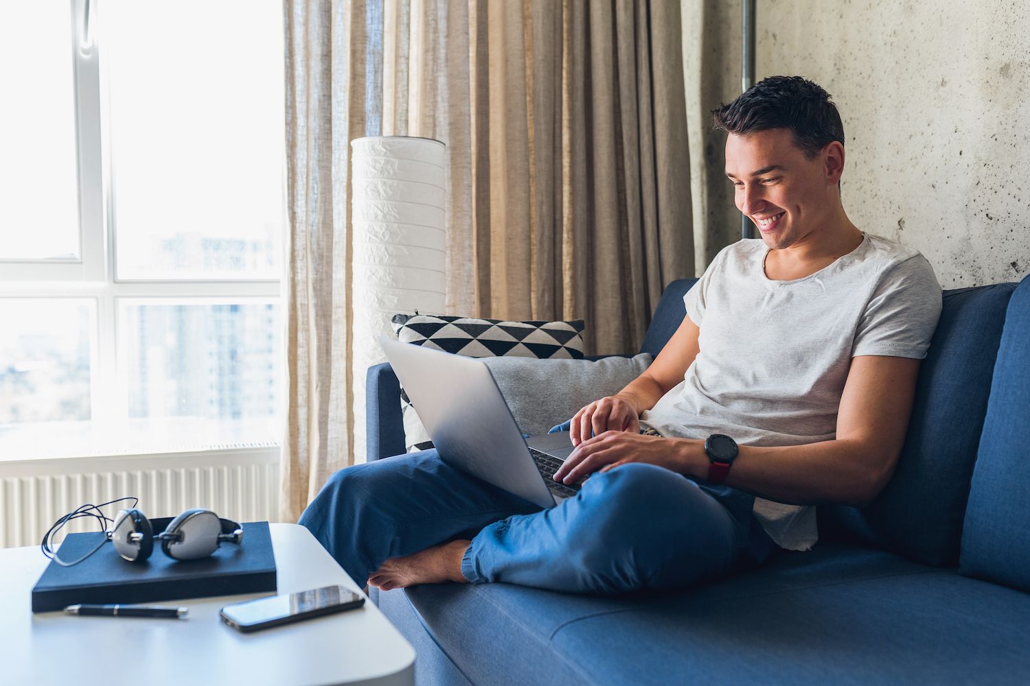 woman working on her laptop and a notebook