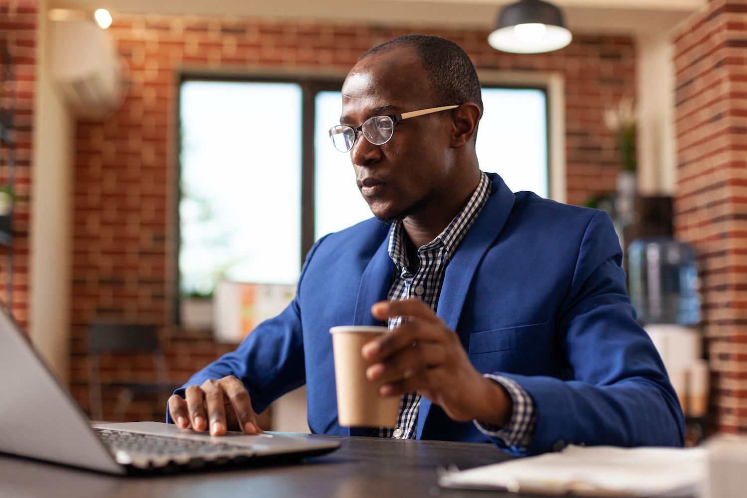 People sending and receiving emails on different devices